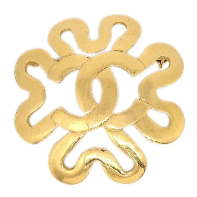 Chanel 1995 Squiggle Border Brooch Gold in Gold from AMORE Vintage Tokyo