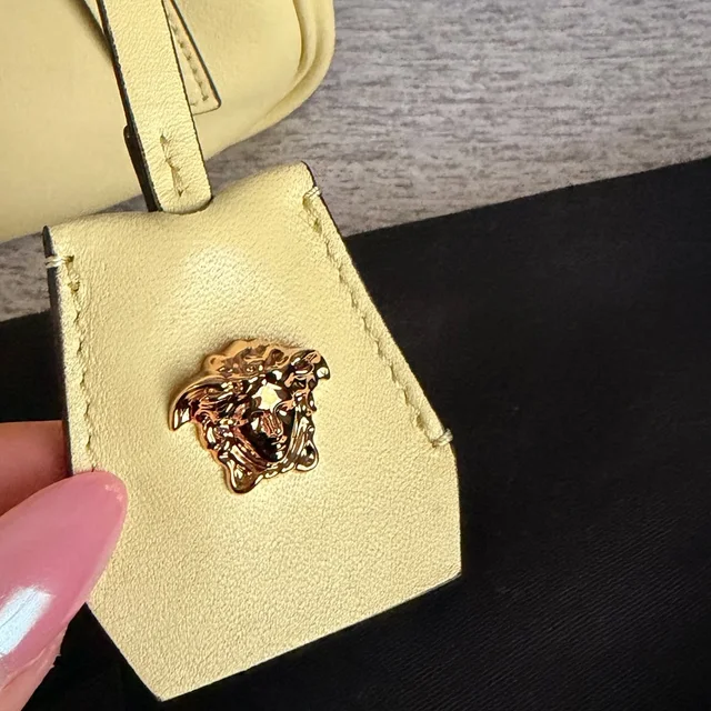 Versace Tag Nappa Bowling Bag in yellow Nappa leather from Poshmark, photo 10 of 15