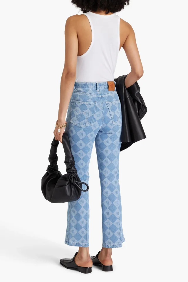 Nanushka Zoey Logo-Print High-Rise Kick-Flare Jeans in Light denim, photo 3 of 4 from THE OUTNET