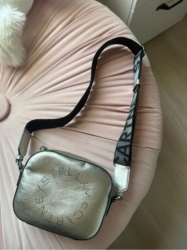 Stella McCartney Metallic Silver Crossbody Bag With Logo-Pattern Strap in silver|black|gray from Poshmark, photo 1 of 1