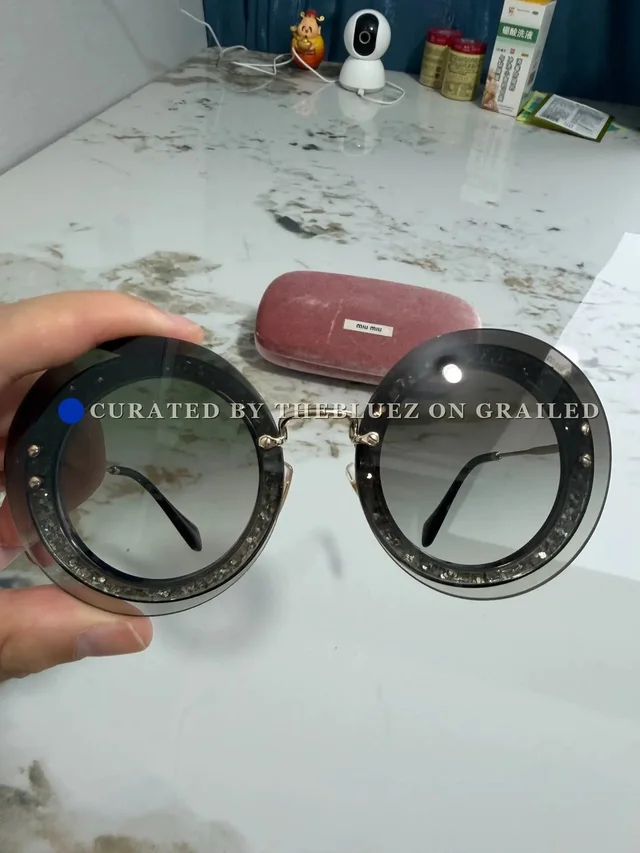 Miu Miu Round Black Frame Sunglasses in black Velvet from Grailed