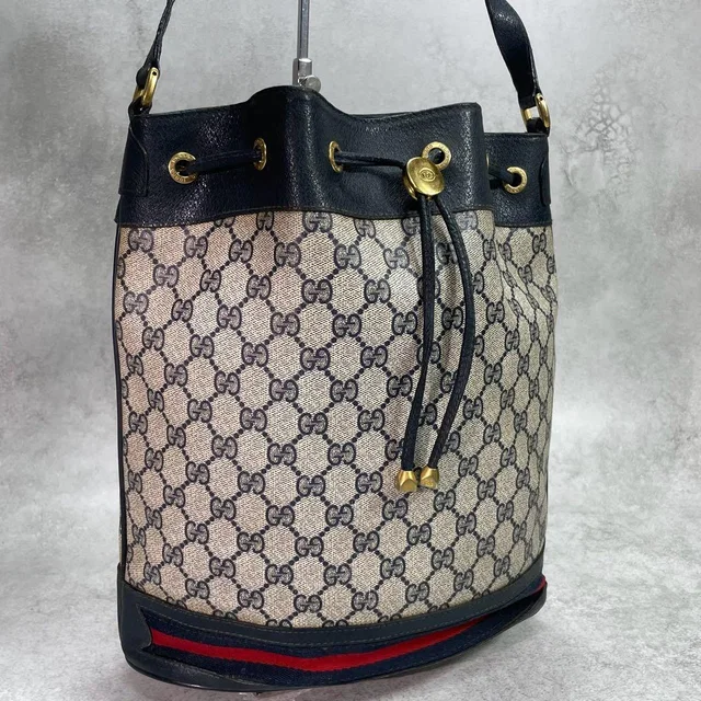 Gucci GG Sherry Line Shoulder Bag Navy Leather Drawstring in Navy Leather from The Reluxe