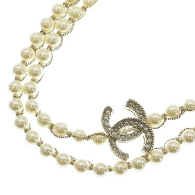 Chanel CC Logo Double Strand Faux Pearl Long Necklace Gold in Gold from The Reluxe