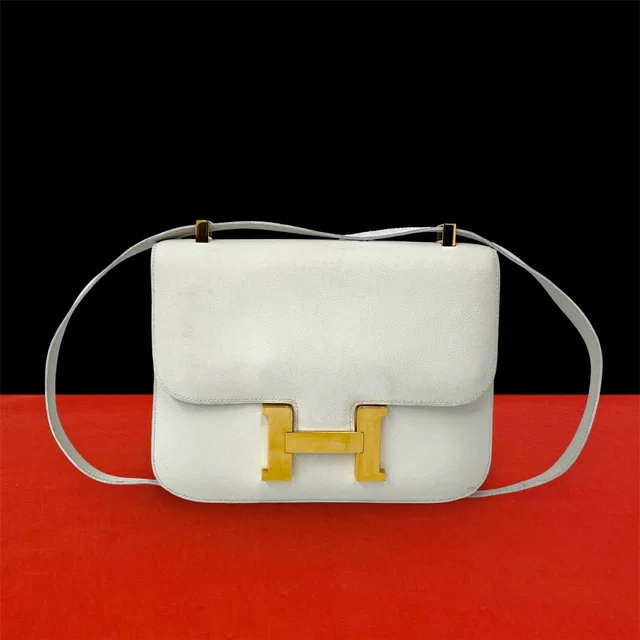 Hermès Vintage Constance 24 Vogulliver Leather Mini Shoulder Bag White in White Leather from The Reluxe