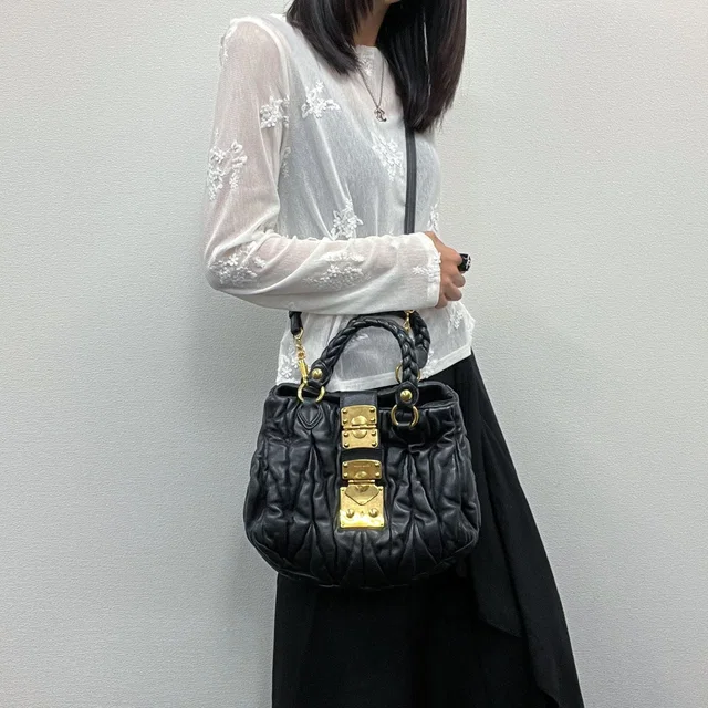 Miu Miu Coffer Matelasse 2-Way Shoulder Bag Leather Black Gold Vintage in Black Leather from The Reluxe