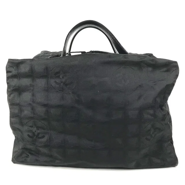 Chanel Handbag CC Logo New Travel Line Nylon Black in Black Nylon from The Reluxe