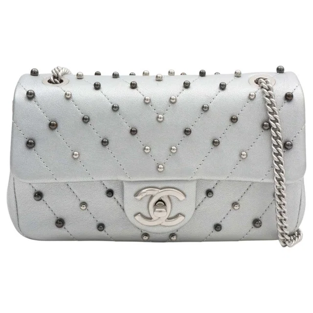 Chanel Around 2017 Made Studded Chevron Stitch CC Turn-Lock Chain Shoulder Bag Mini Silver in Silver Lambskin from VINTAGE QOO TOKYO