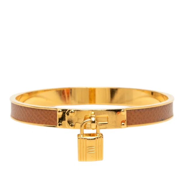 Gold Hermès Gold Plated Epsom Kelly Cadena Lock Bangle Bracelet in Gold Epsom leather from Designer Revival