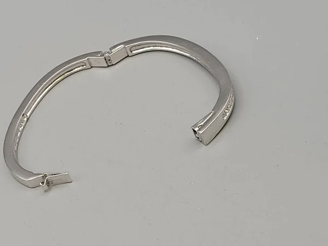 Swarovski Tone Crystal Bangle Bracelet Swan Mark in Silver Crystals from Oxfam Online Shop, photo 2 of 2