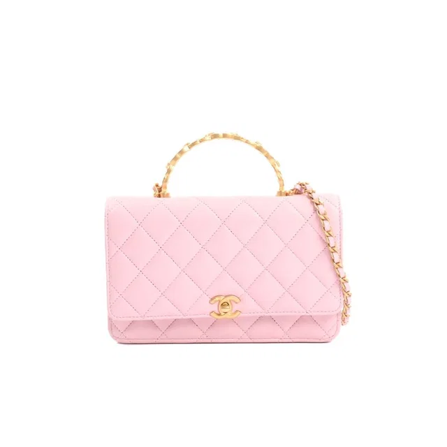 Chanel Chain Wallet Top Handle Shoulder Bag in Lambskin from The Reluxe