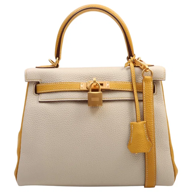 Hermès 2021 Kelly 25 Craie/Jaune Ambre in White Clemence leather from VINTAGE QOO TOKYO