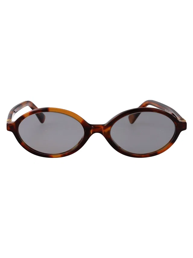 Miu Miu 0mu Acetate Oval Frame Sunglasses — Brown in Brown from HEWI
