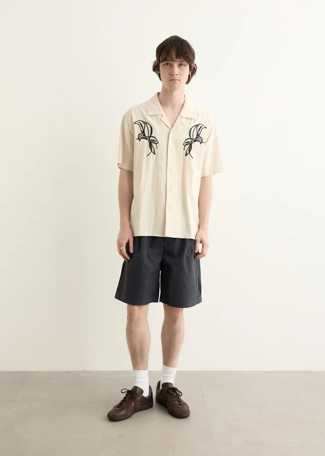 Incu Collection Smokestack Pleated Shorts in Blue from Incu, photo 1 of 1