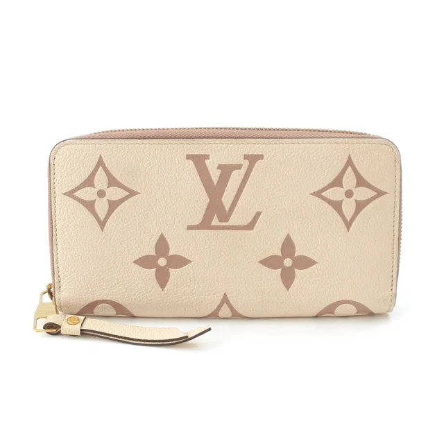 Louis Vuitton Zippy Wallet Monogram Empreinte Ivory in White from The Reluxe