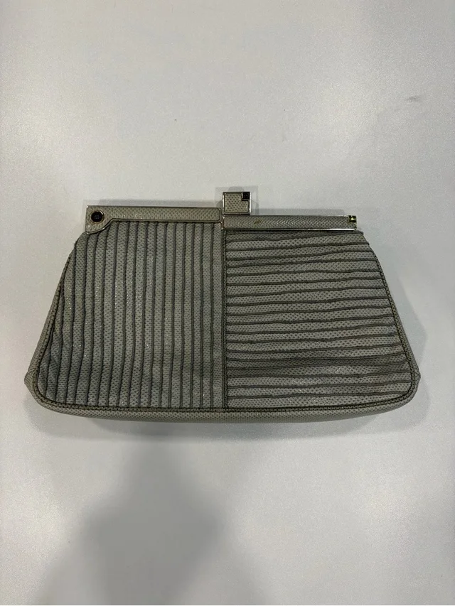Judith Leiber Textured Stripe Clutch in gray from Poshmark, photo 1 of 1