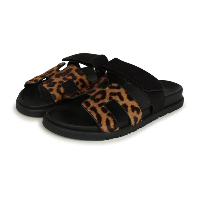 Hermès Leopard Print Chypre Techno Sandals Gold & Black Moire in Black Calfskin from Madison Avenue Couture