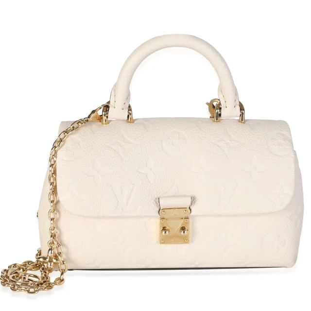 Louis Vuitton Cream Monogram Empreinte Nano Madeleine in White Coated canvas from myGemma