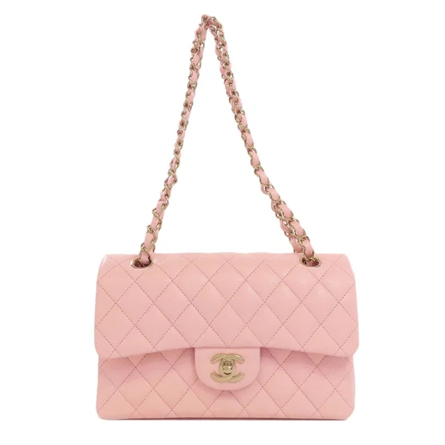 Chanel Quilted Double Flap Gold Shoulder Bag Grained Calfskin in Gold Caviar leather from The Reluxe