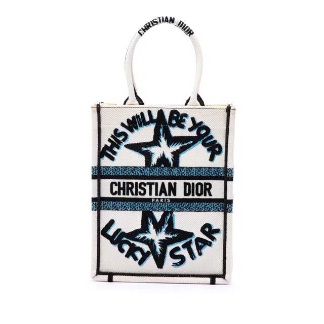 White Dior Embroidered Canvas Lucky Star Vertical Book Tote in White Canvas from Designer Revival