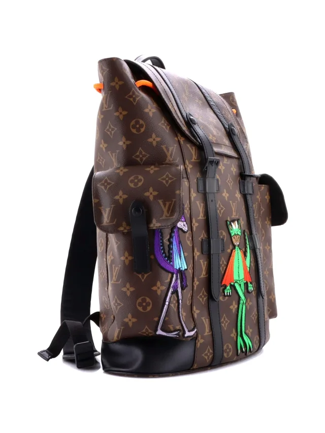 Louis Vuitton Pre-Owned Christopher Monogram Canvas in Brown Coated canvas from Farfetch, photo 1 of 1