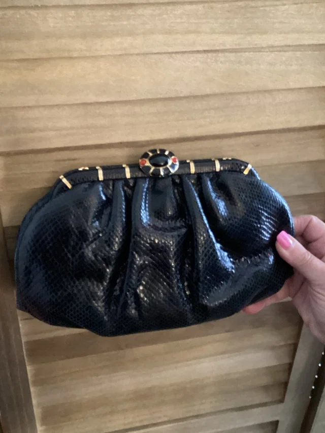 Judith Leiber Snake Skin Clutch With Gold-Tone Frame And Enamel Clasp in black from Poshmark, photo 1 of 1