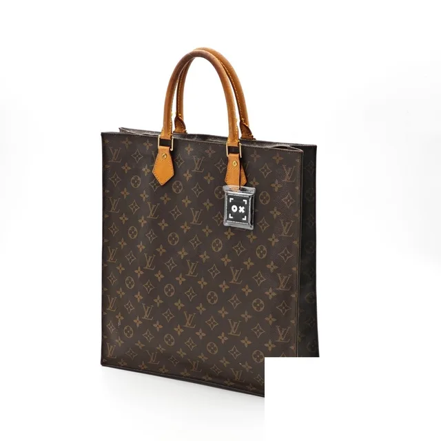 Louis Vuitton Sac Plat Bag Handbag Brown in Brown Coated canvas from The Reluxe