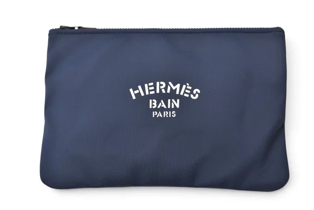 Hermès Pouch Flat Neobain MM Nylon Navy in Navy Nylon from The Reluxe