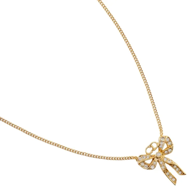 Dior Tone Crystal Bow CD Pendant in Gold from Blue Spinach