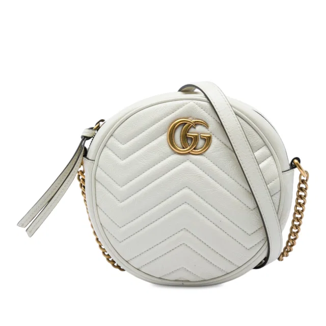 White Gucci Mini GG Marmont Matelasse Calfskin Round Crossbody in White Calfskin from Designer Revival