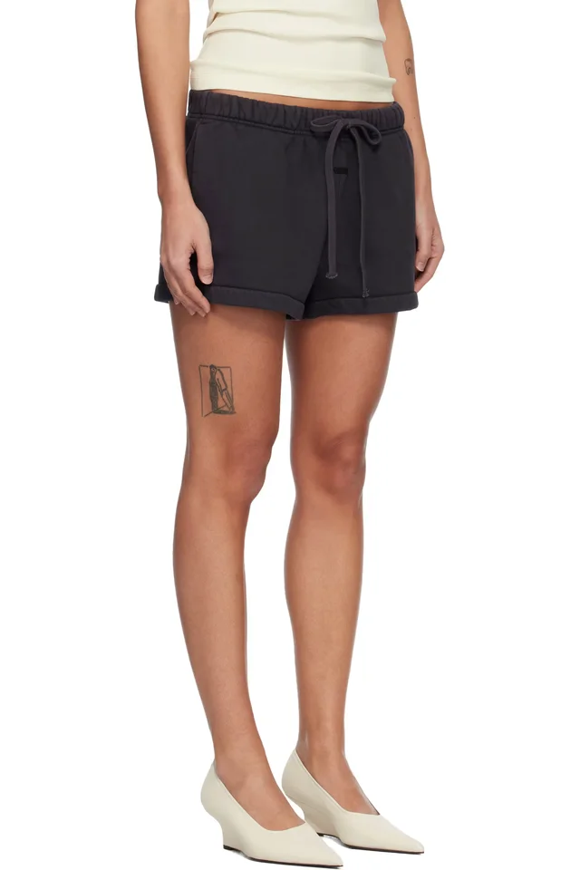 Fear of God ESSENTIALS Black Signature Running Shorts, photo 2 of 4 from SSENSE