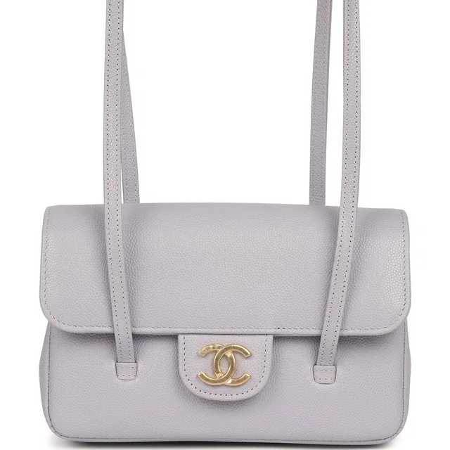 Chanel Mini Preppy Coco Clutch in Purple Caviar leather from Madison Avenue Couture