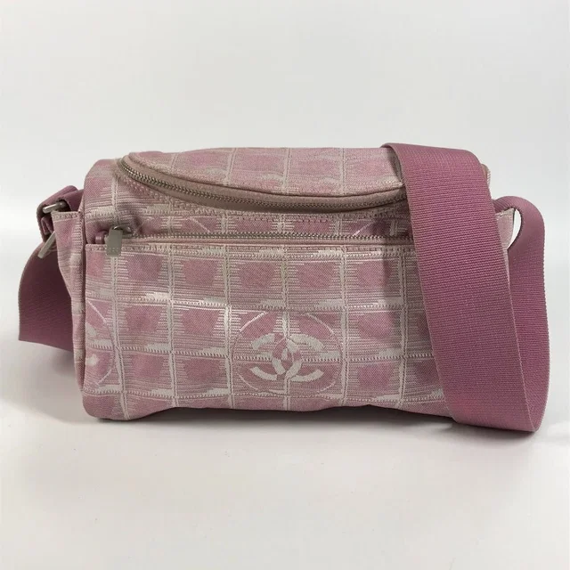 Chanel Shoulder Bag CC Logo CC Nylon Canvas Pink in Pink Canvas from The Reluxe