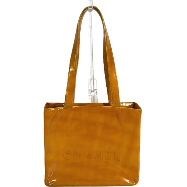 Chanel Shoulder Bag Logo Patent Yellow in Yellow Patent leather from The Reluxe