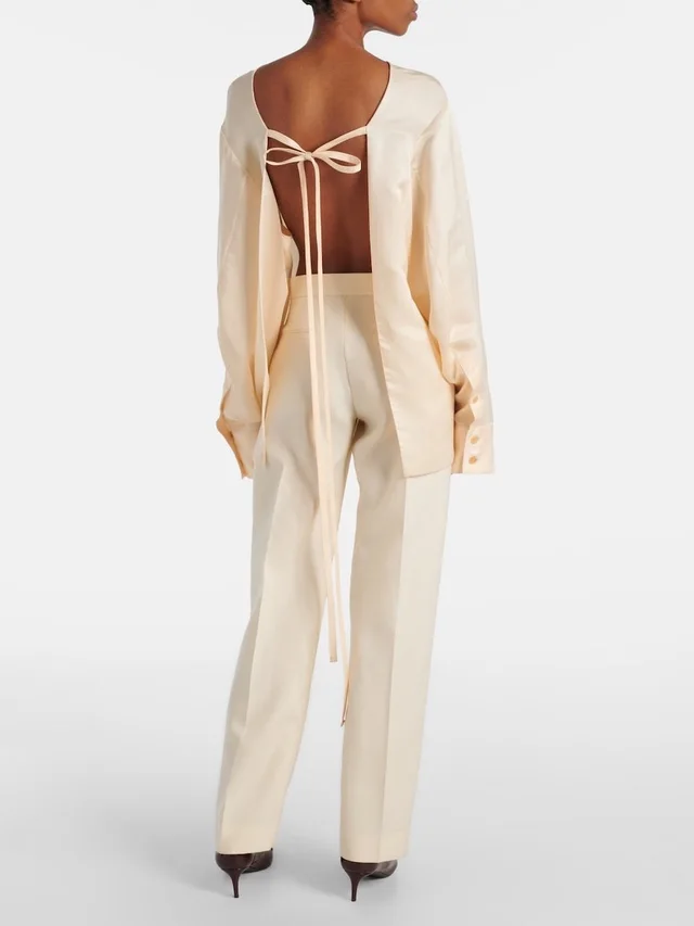 Khaite Cream Tailored Long Pants in White from Poshmark
