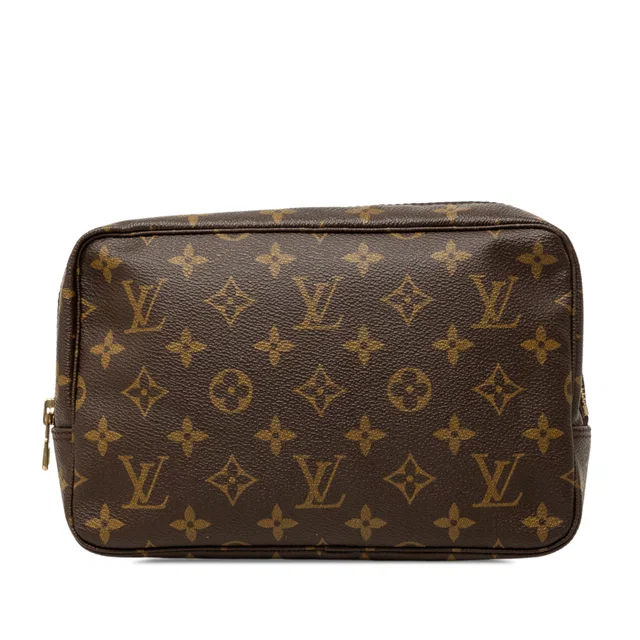 Brown Louis Vuitton Monogram Trousse Toilette 23 Clutch Bag in Brown Coated canvas from Designer Revival