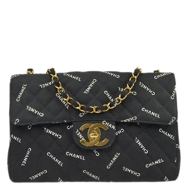 Chanel 1994-1996 Black Canvas Maxi Classic Flap Shoulder Bag in Black Canvas from AMORE Vintage Tokyo