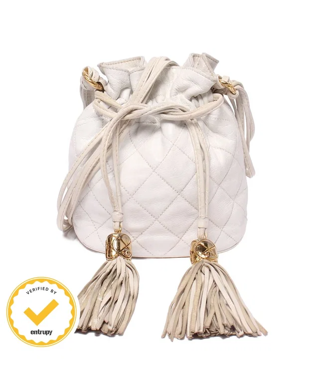 Chanel Shoulder Bag Crossbody Gold Drawstring Quilted in Gold from The Reluxe
