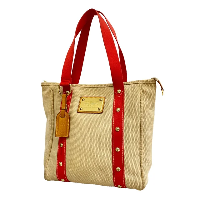 Louis Vuitton Tote Bag Antigua Cabas MM Beige in Beige from The Reluxe