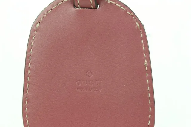 Gucci Mauve Clochette Luggage Tag from Reversible Supreme GG Tote in Leather from Bagriculture