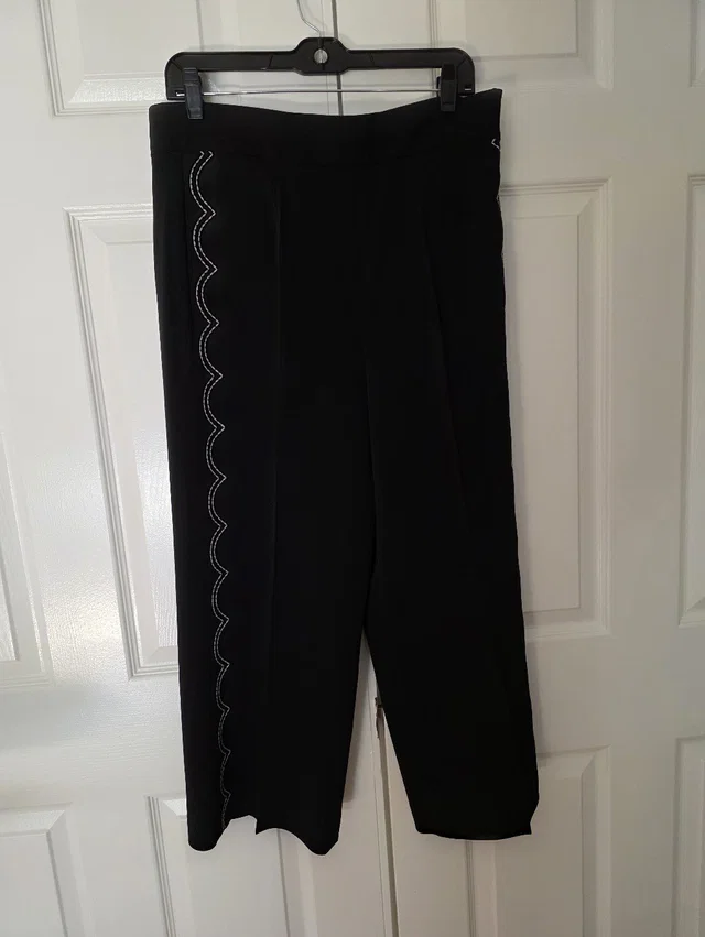 REDValentino Women's Garment With Branded Neck Label in black from Poshmark