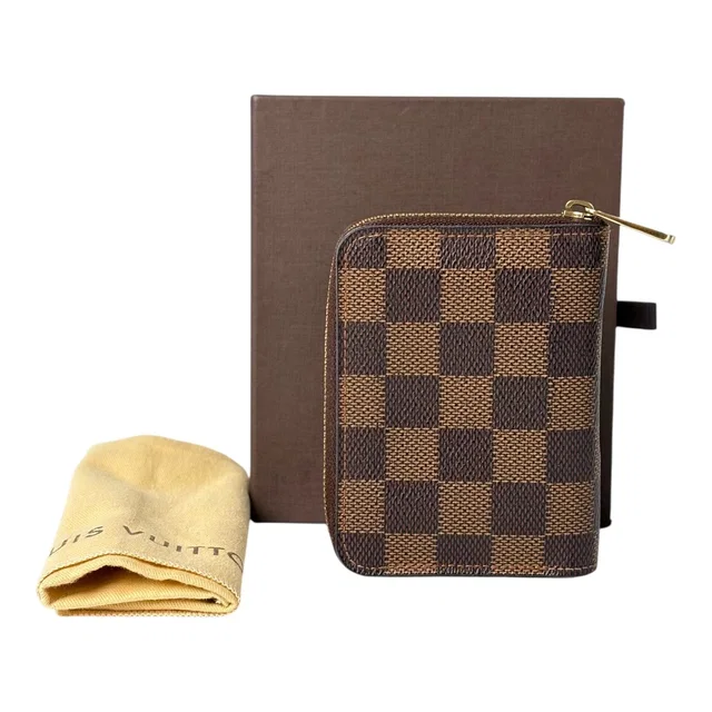 Louis Vuitton Damier Ebene Wallet in Brown from Luxury Promise
