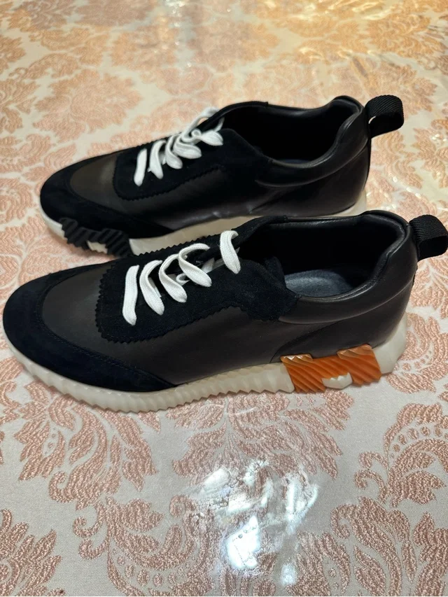 Hermès Black Leather And Suede Sneakers With White Laces And Orange Accent in black|white Suede from Poshmark