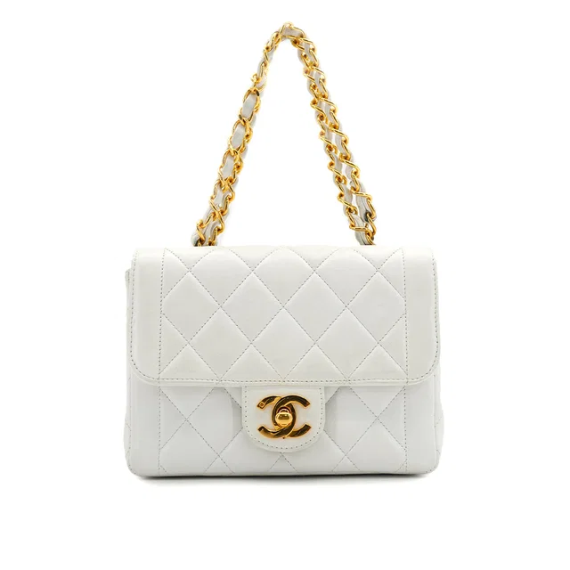 Chanel Vintage Matelasse Chain Hand Bag White Lamb Skin Gold Hardware in White from Luxury Promise