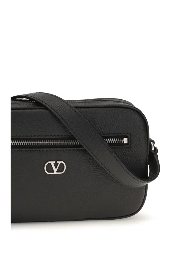 Valentino Garavani Grained Calf Leather Crossbody Bag — Black in Black Calfskin from HEWI