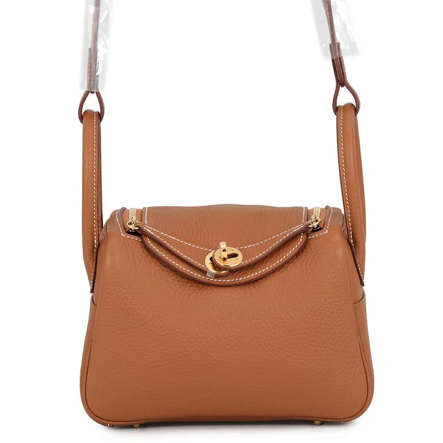 Hermès Lindy Gold Taurillon Clemence Size Mini in Gold Clemence leather from GALLERY RARE