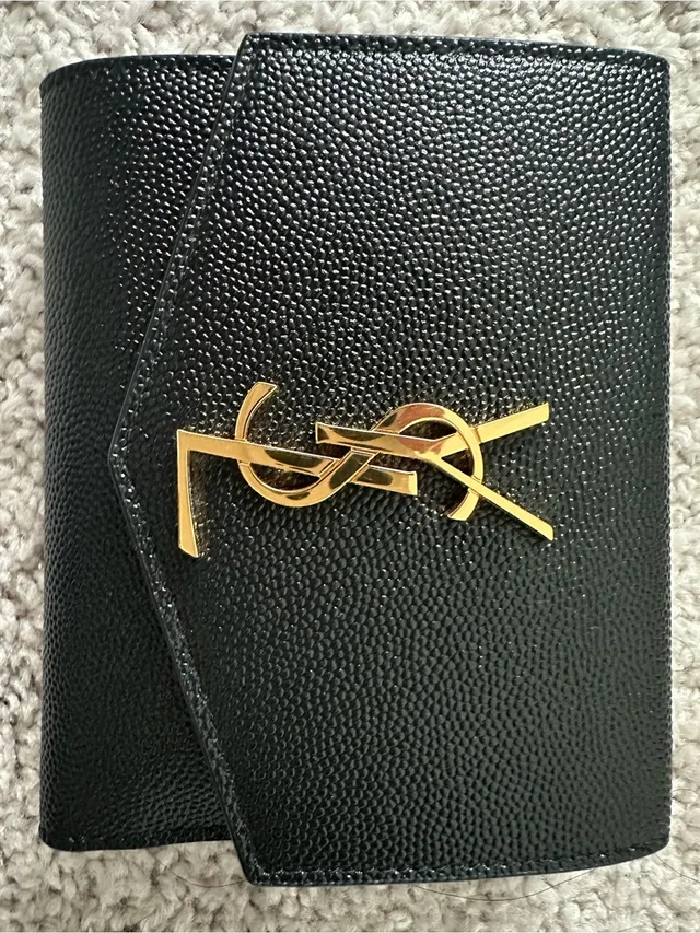 Black Pebbled Leather Wallet With Gold Ysl Emblem in black|gold Leather from Poshmark, photo 1 of 1
