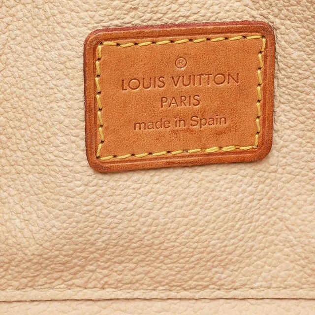 Louis Vuitton Monogram Cosmetic Pouch in Coated canvas from A Retro Tale, photo 8 of 9