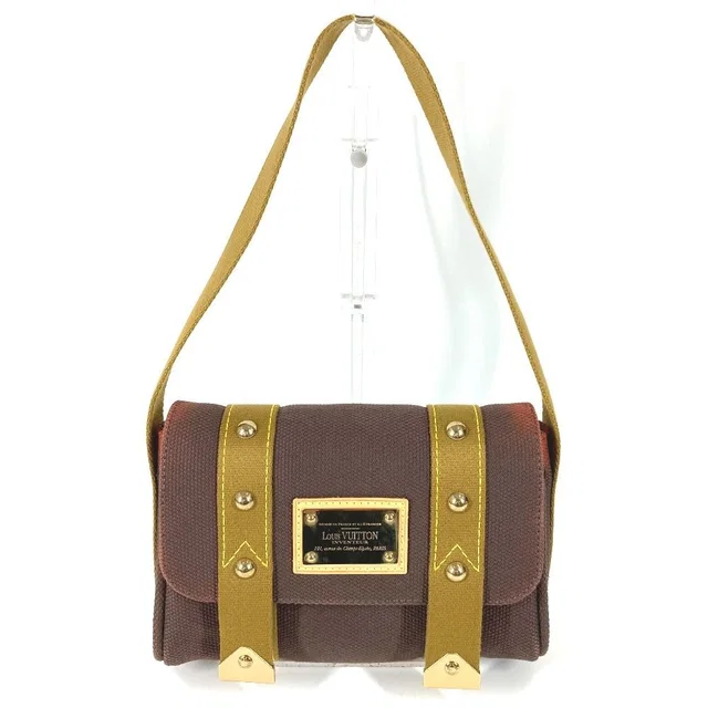Louis Vuitton Shoulder Bag Sac Mule Canvas Brown in Brown Canvas from The Reluxe