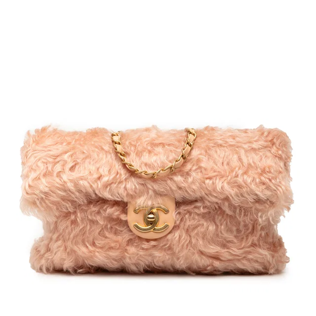 Pink Chanel CC Fantasy Fur Clutch with Chain in Pink Woven leather from Designer Revival