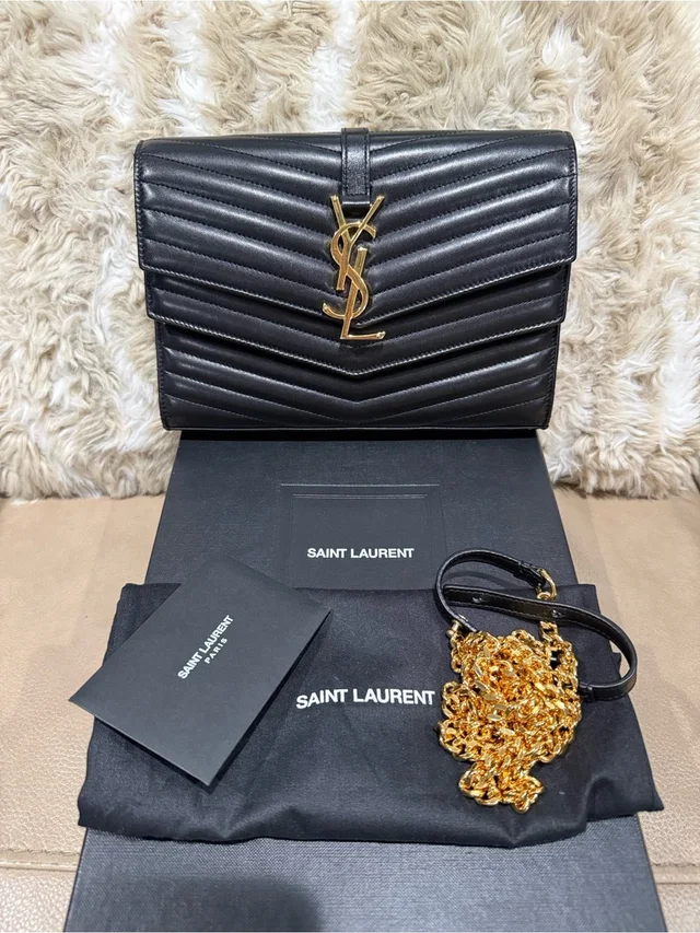 Saint Laurent Black Chevron Quilted Leather Shoulder Bag in black|gold Leather from Poshmark, photo 1 of 1